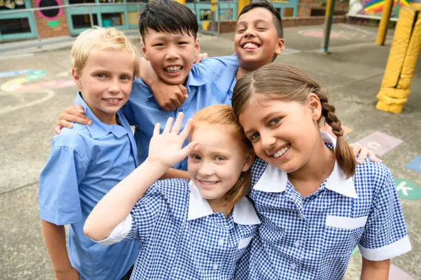 aussie-students A teacher exemplifying one of the 10 essential classroom management skills as her class is focused and organised.