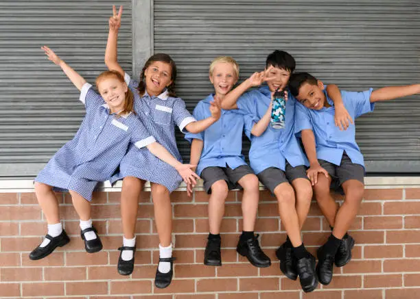 aussiekids A teacher exemplifying one of the 10 essential classroom management skills as her class is focused and organised.