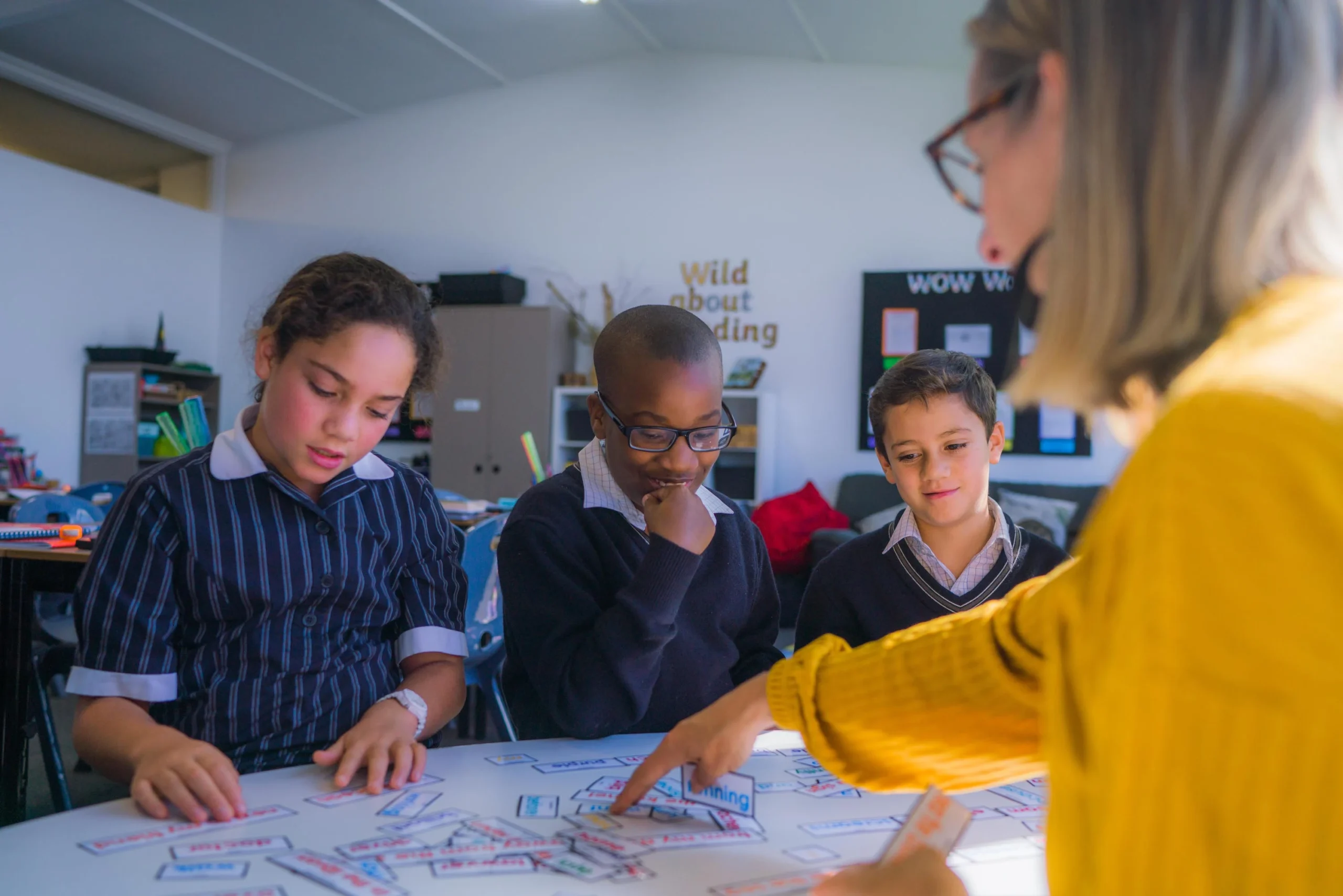 australianschools A teacher exemplifying one of the 10 essential classroom management skills as her class is focused and organised.