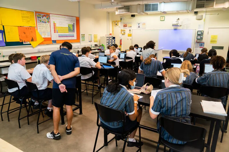 australian classroom A teacher exemplifying one of the 10 essential classroom management skills as her class is focused and organised.